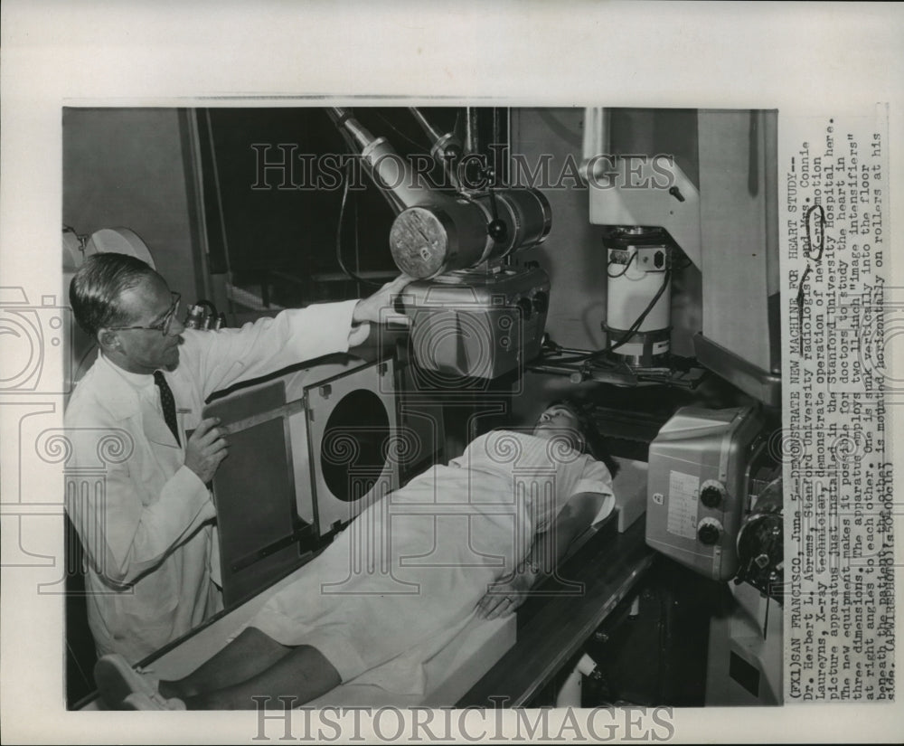 1958 Dr. Herbert L. Abrams shows new X-ray machine in California - Historic Images