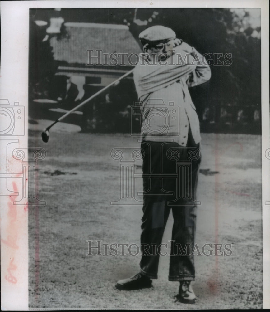 1963 British Prime Minister Harold Macmillan plays golf in Scotland - Historic Images