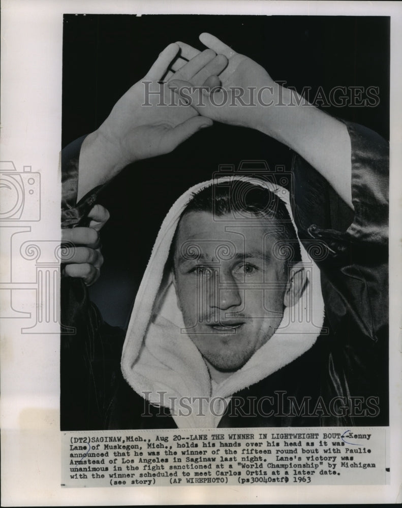 1963 Press Photo Boxer Kenny Lane won a fifteen-round bout in Saginaw, Michigan- Historic Images