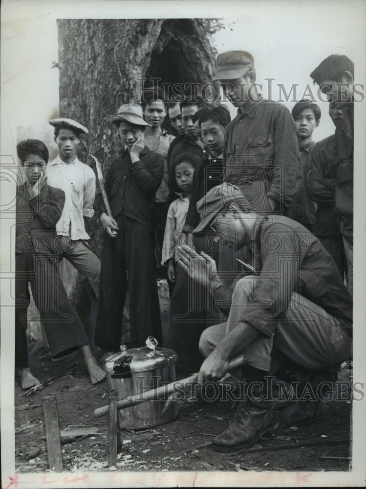 1961 Press Photo Ivan Klecka helps Meo refugees build stand for sterilizer, Laos - Historic Images