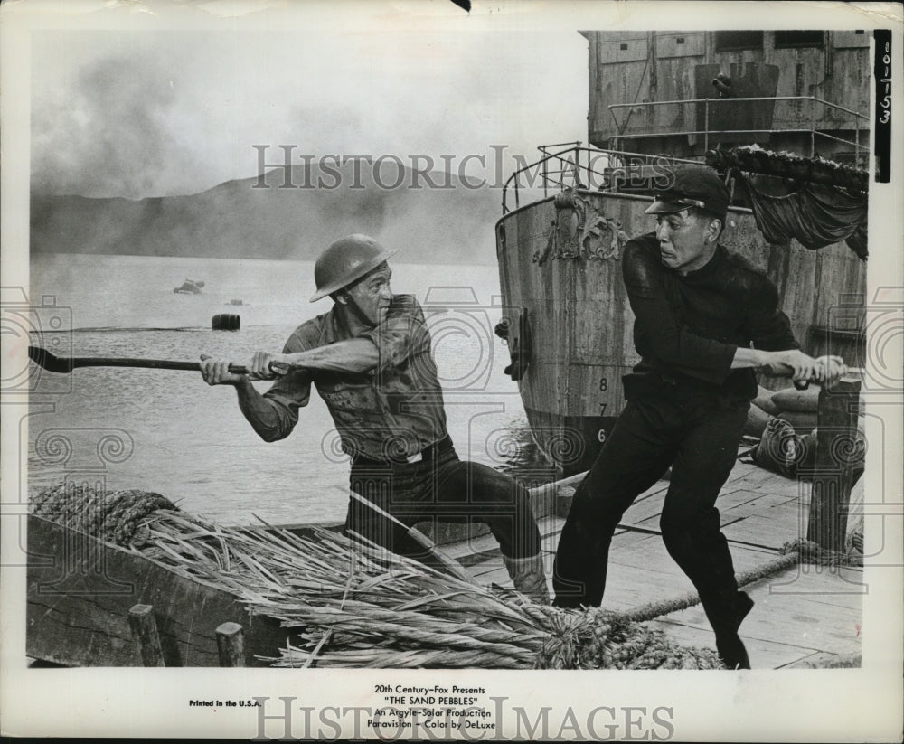 1962 Press Photo Steve McQueen battles a rebel in scene from "The Sand Pebbles"-Historic Images