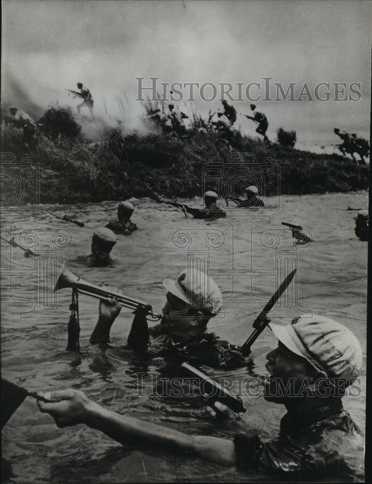 1966 Press Photo Bugle sounded a call to ward off evil spirits. - mjx19436-Historic Images