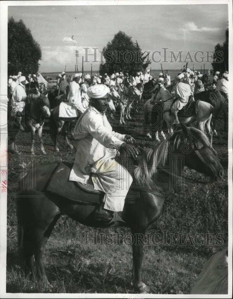 1961 Press Photo Morocco tribesmen assemble charge outside Rabat on horseback.- Historic Images