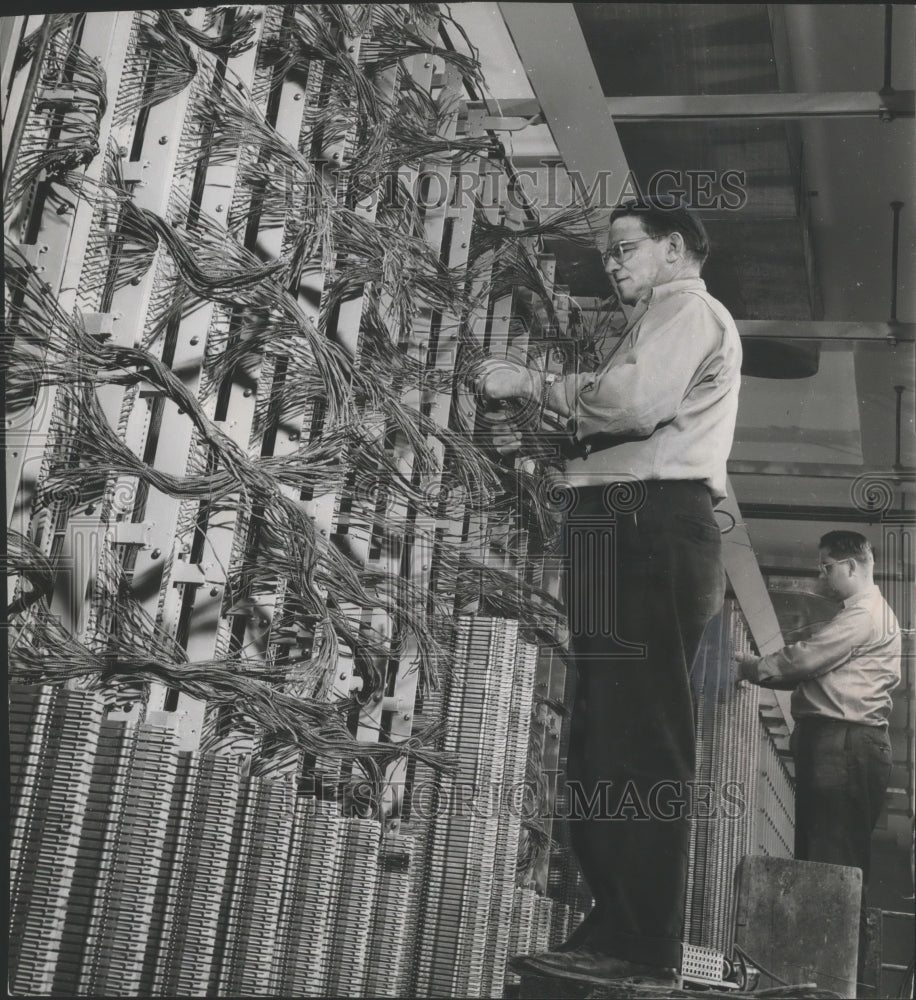 1953 Press Photo George Lagerman works on the new Wisconsin Telephone Company - Historic Images