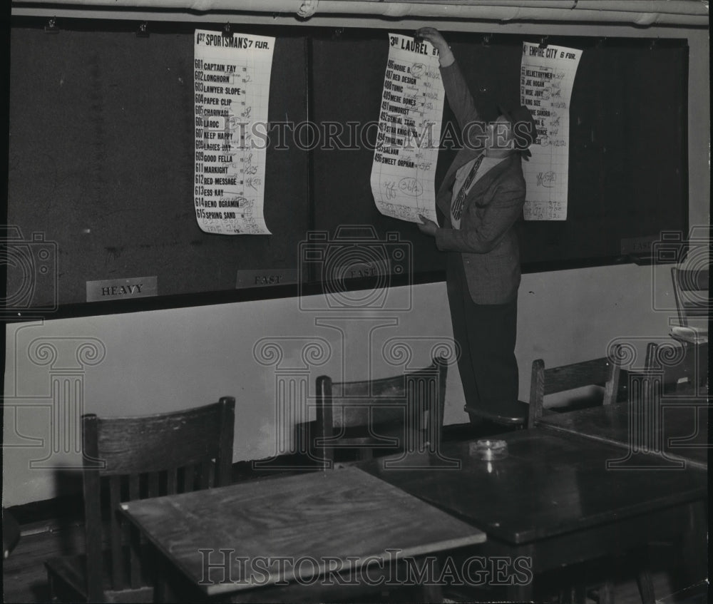 1949 Press Photo Deputy Henry Sapinski removes &quot;soft sheets&quot; at The Spa-Historic Images