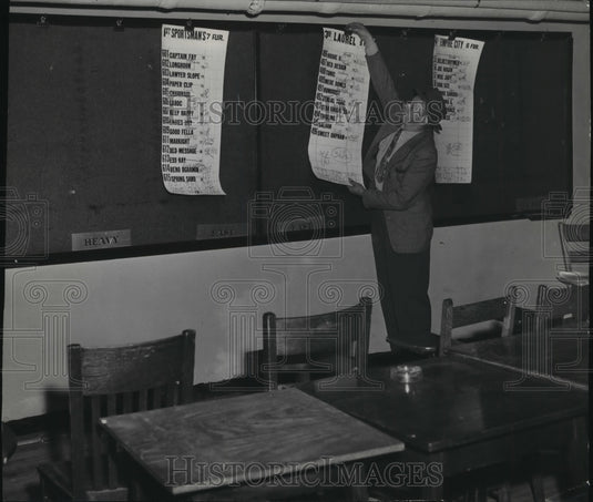 1949 Press Photo Deputy Henry Sapinski removes "soft sheets" at The Spa-Historic Images