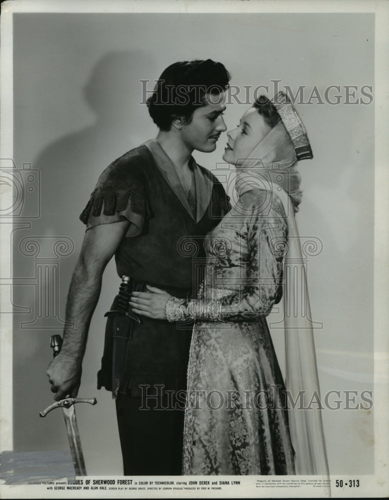 1950 Press Photo John Derek and Diana Lynn in "Rogues of Sherwood Forest" - Historic Images