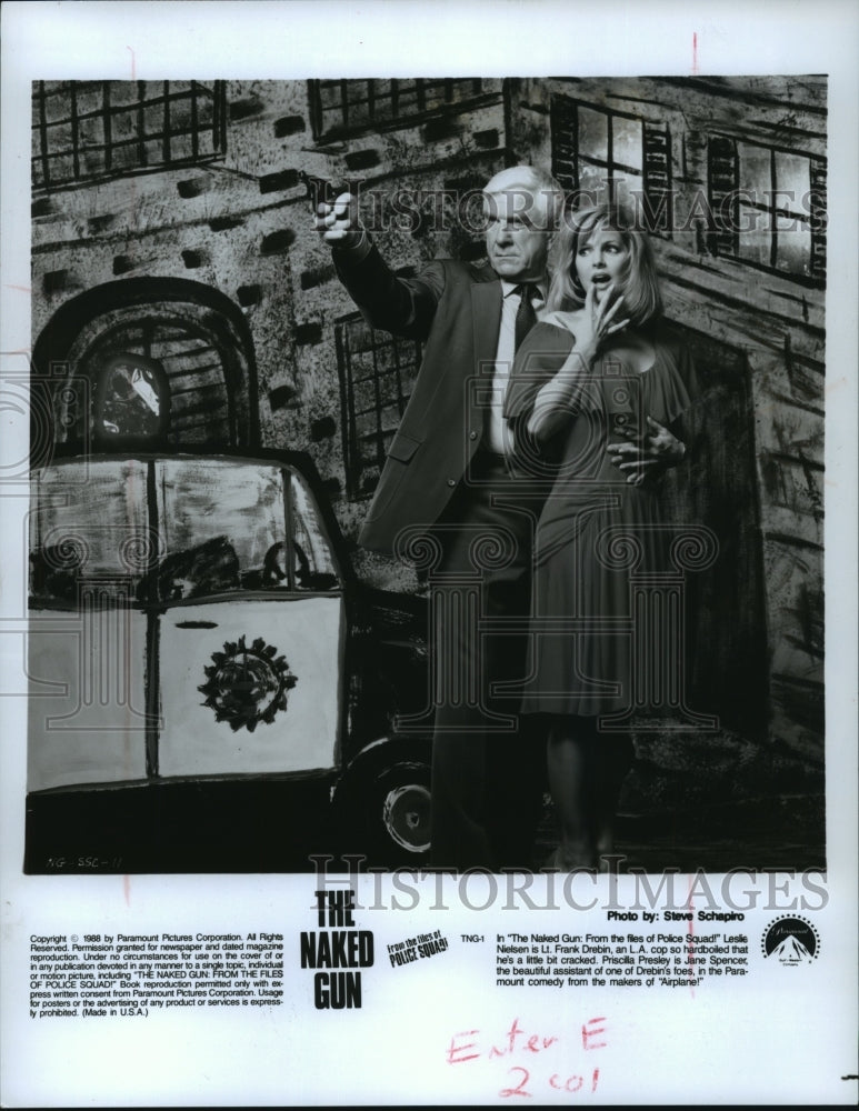 1988 Press Photo Leslie Nielsen and Priscilla Presley In &quot;The Naked Gun&quot; - Historic Images