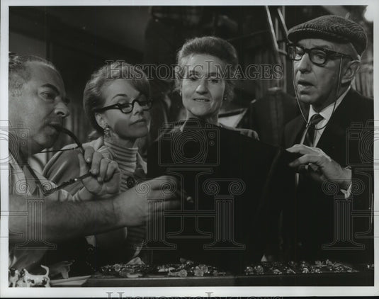 1969 Press Photo Lloyd Nolan and Group in "Julia" - mjx28390-Historic Images