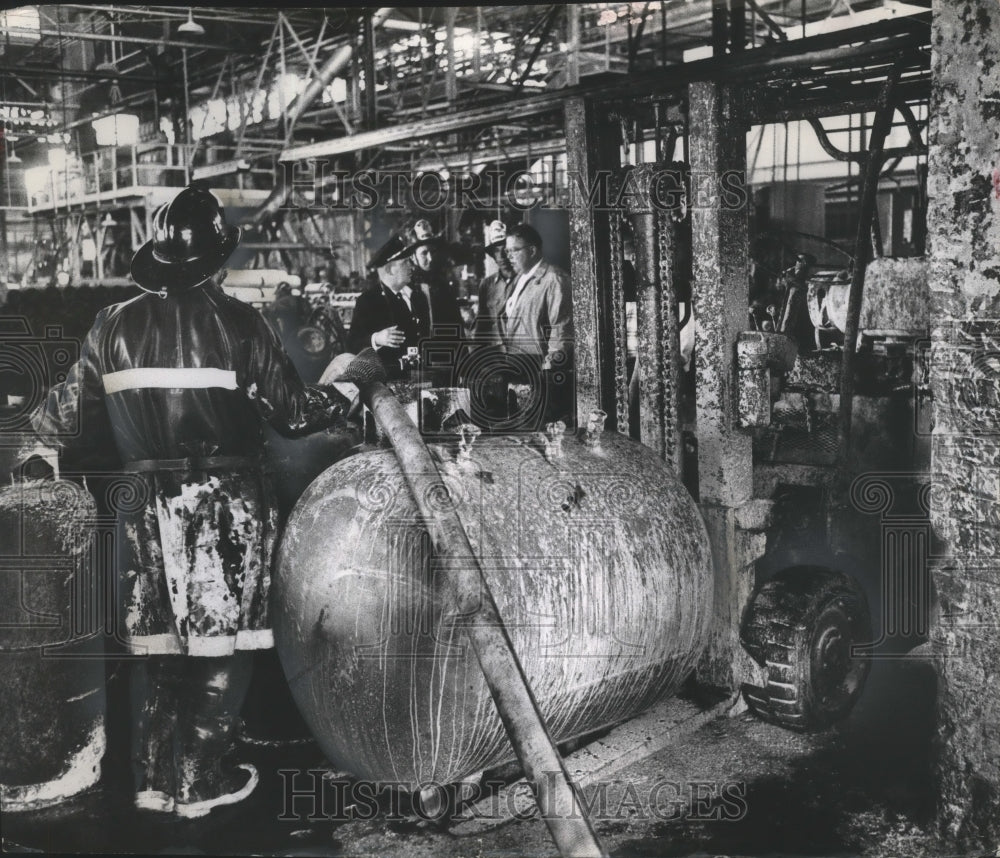 1962 Press Photo Firemen Inspect Pressed Steel Tank Co. After Explosion, Milwauk-Historic Images