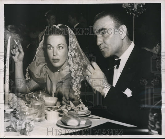 1953 Press Photo Henry Wilcoxen and his wife at a Hollywood paty - mjx34365-Historic Images