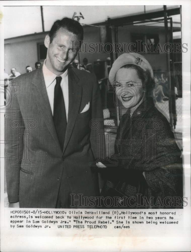 1957 Actress Olivia DeHavilland  with Sam Goldwyn Jr., Hollywood-Historic Images