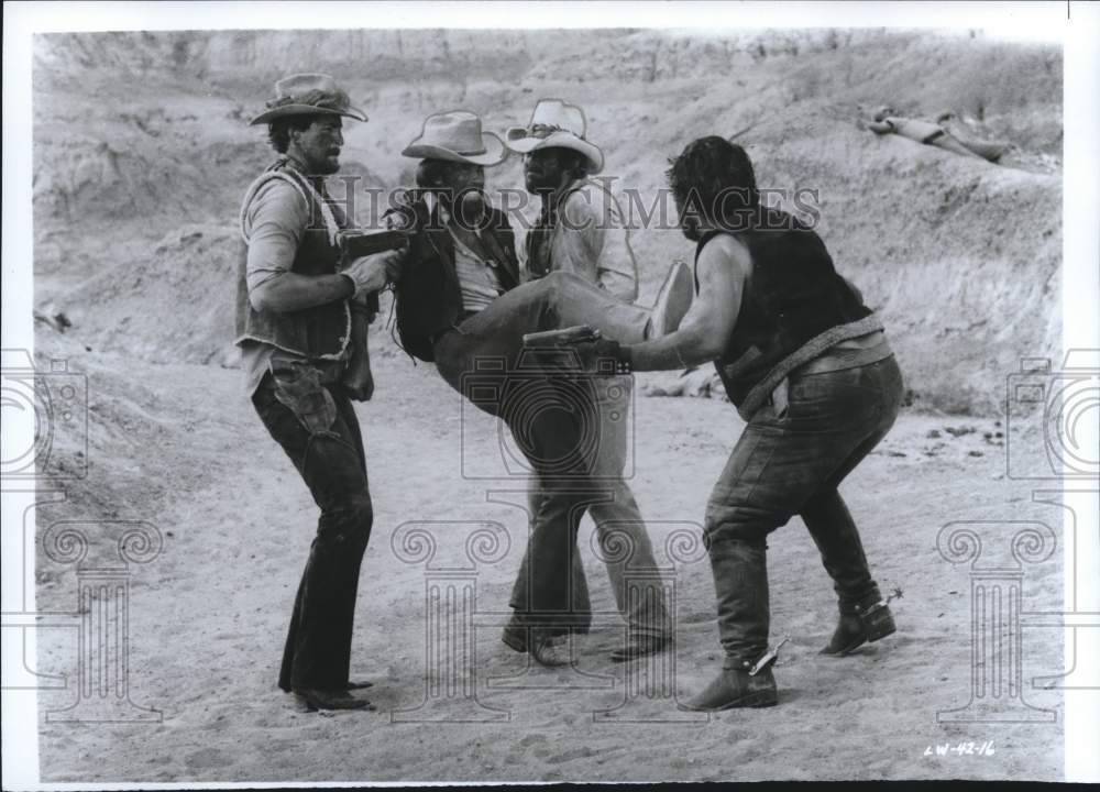 1983 Press Photo Chuck Norris battling three enemies in "Lone Wolf McQuade" film - Historic Images