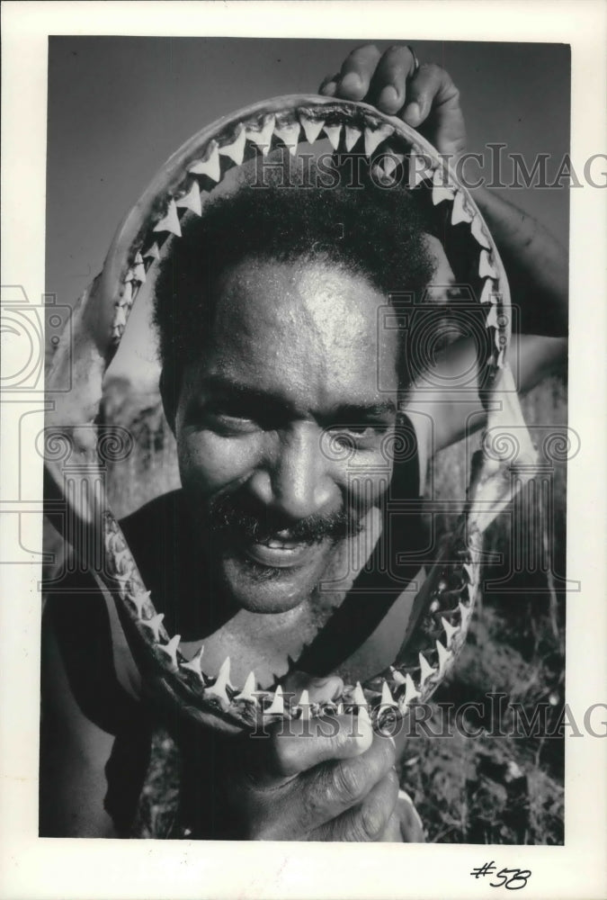 1984 Eladio Vanegas holds the jawbone of a 400 pound bull shark.-Historic Images