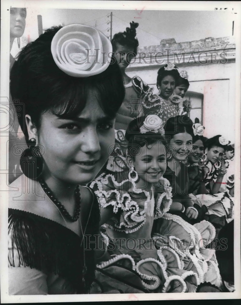 1972 Spanish girls dress up for fiestas ad parades. - Historic Images