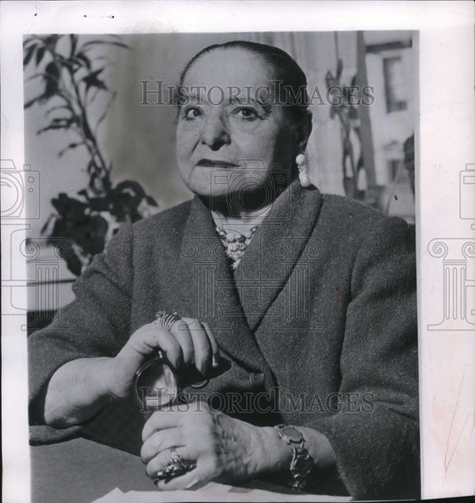 1958 Helena Rubinstein in her eighties sits in her New York office.-Historic Images