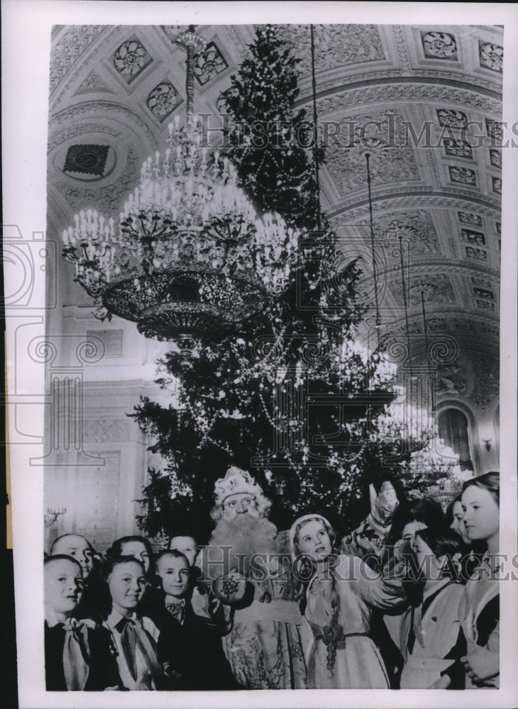 1954 Father Frost is shown with Snow Maiden inside the Kremlin Palace-Historic Images