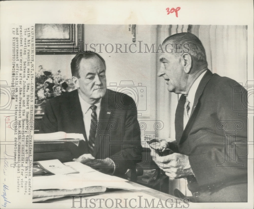 1964 Press Photo Lyndon Johnson spoke with Hubert Humphrey at the White House.- Historic Images