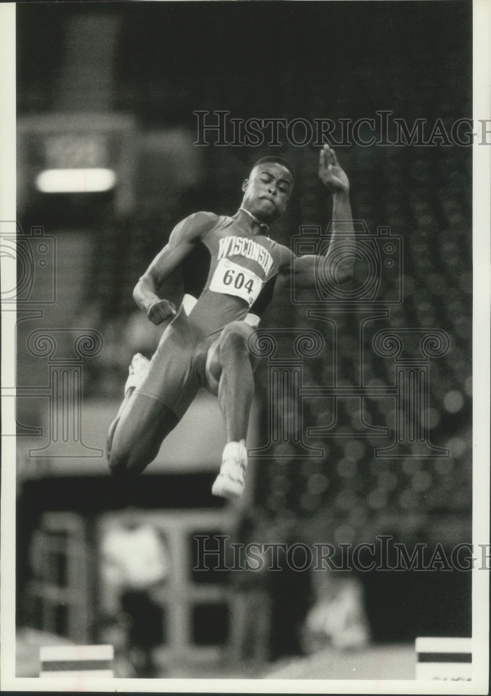 1994 Football Player Reggie Torian Competes in the Long Jump - Historic Images