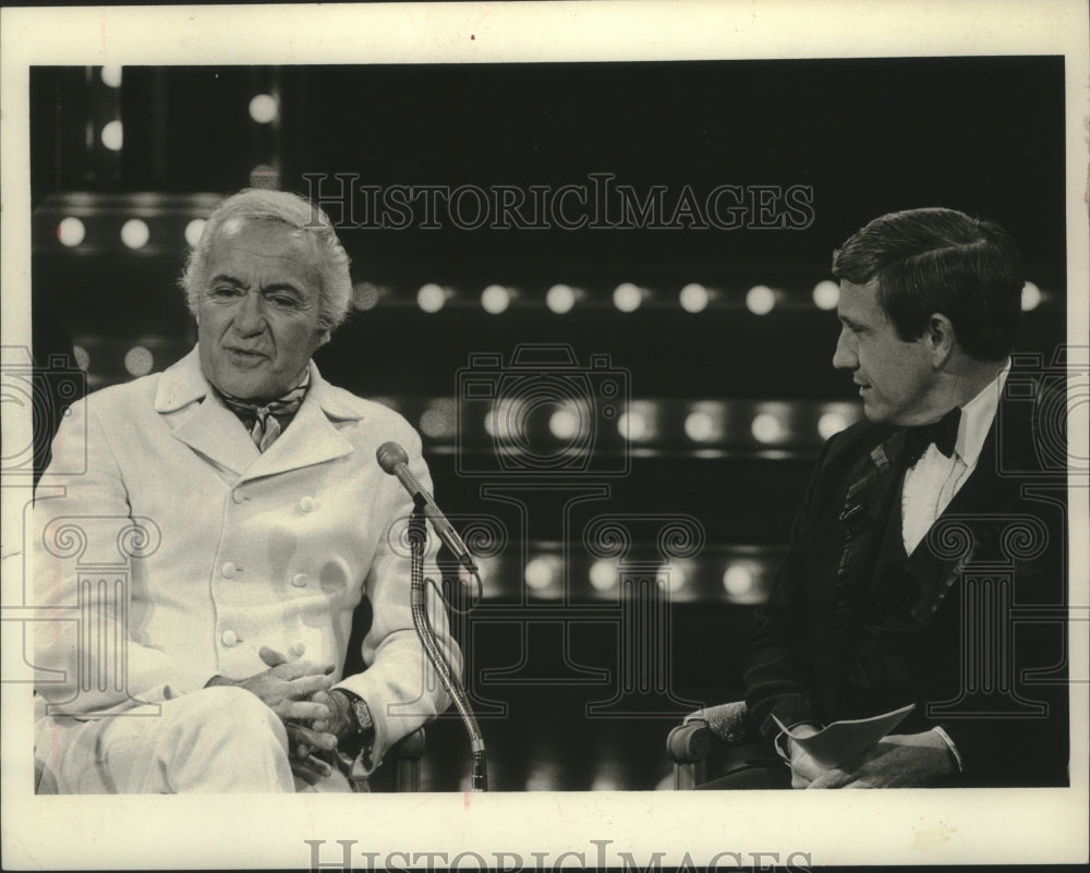 1971 Buddy Rogers chats with Merv Griffin on "The Merv Griffin Show" - Historic Images