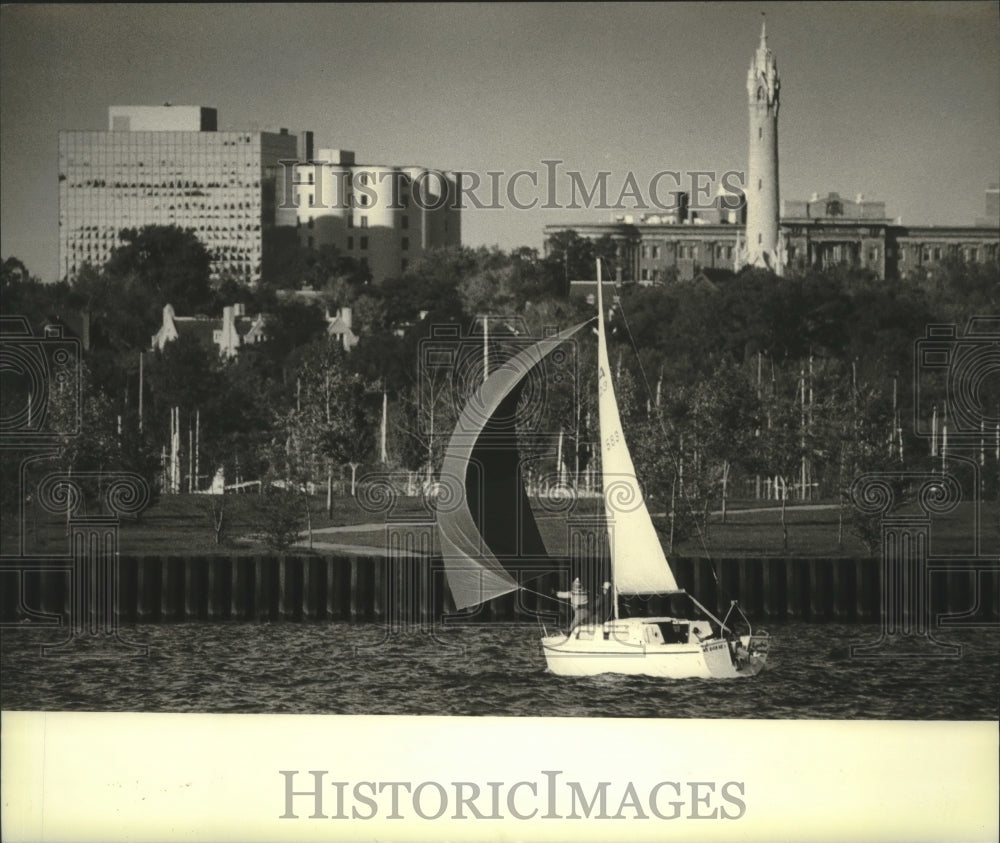 1980 Sailboat approaches shore on Milwaukee Harbor - Historic Images