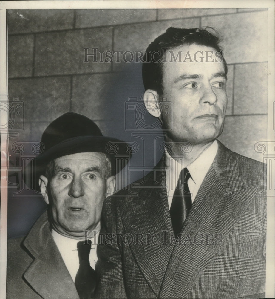 1953 Press Photo John Provoo in custody of federal marshal in New York.- Historic Images