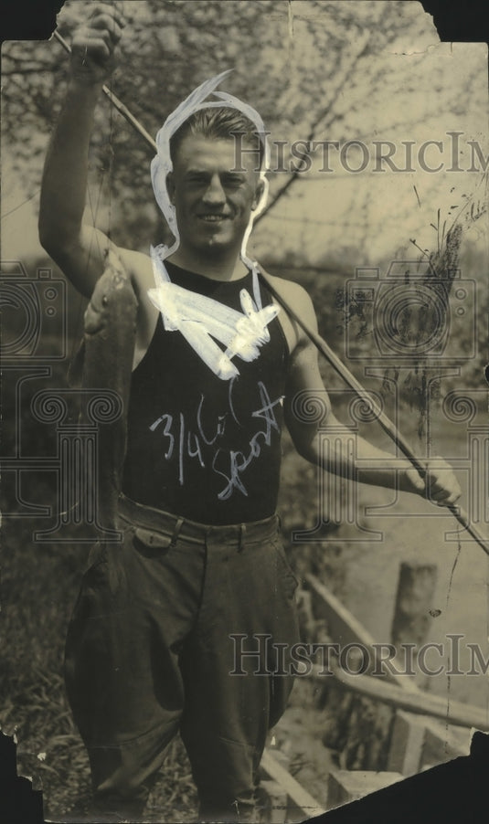 Richie Mitchell caught fish. - Historic Images