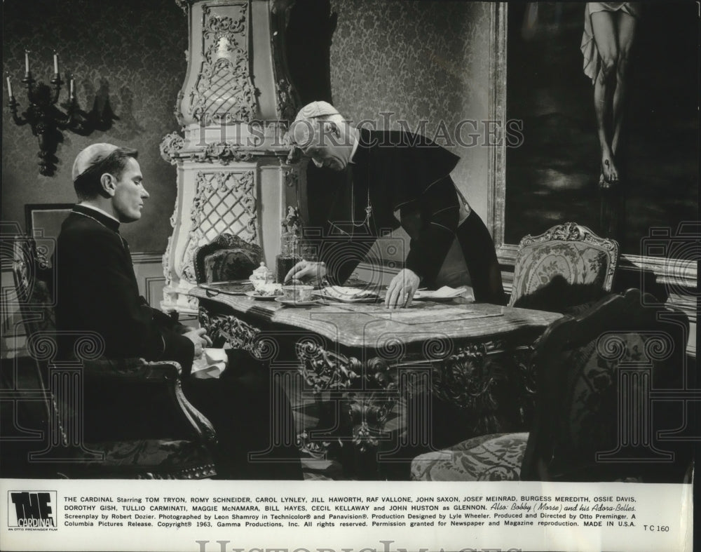 1964 Tom Tryon and Josef Meinrad in a scene from "The Cardinal" - Historic Images