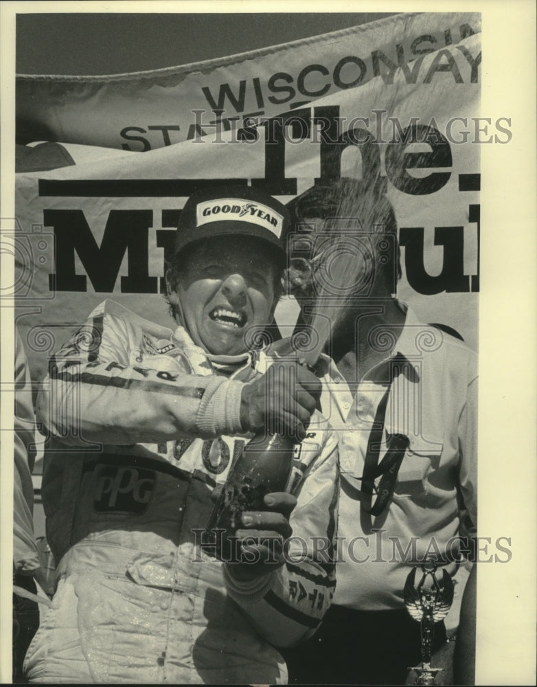 1984 Press Photo Tom Sneva celebrates winning the Dana-Rex Mays 200 - mjx57087 - Historic Images