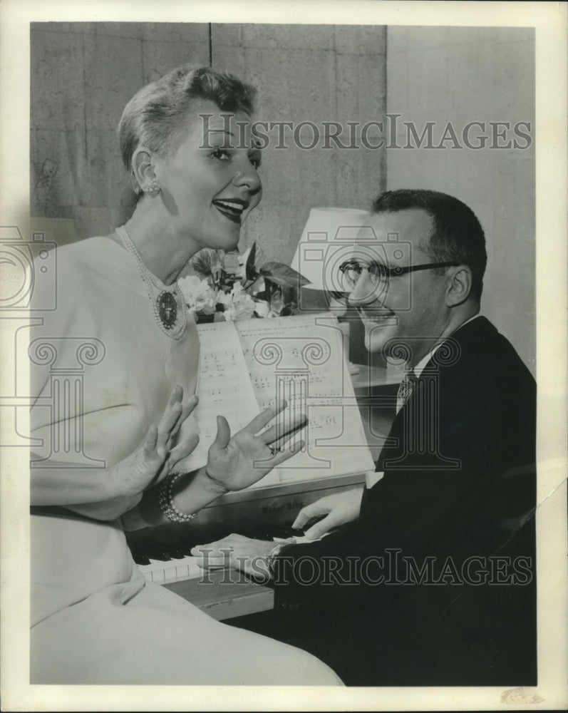 1958 Press Photo Mary Martin and Johnny Lesko play a piece from concert tour. - Historic Images