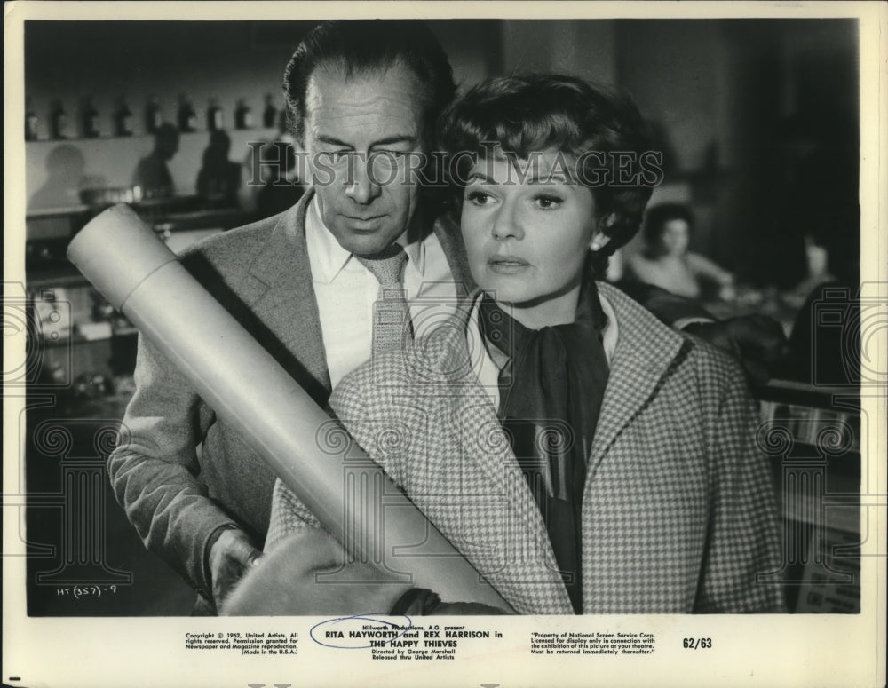 1962 Press Photo Rita Hayworth and Rex Harrison star in "The Happy Thieves" - Historic Images