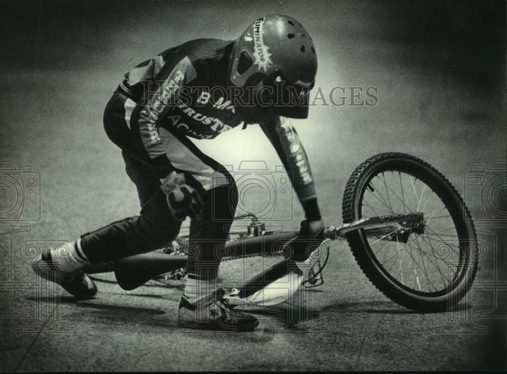 1983 Press Photo BMX Rider Picks Up Bicycle During Race At Annual Can-Am Cassidy- Historic Images