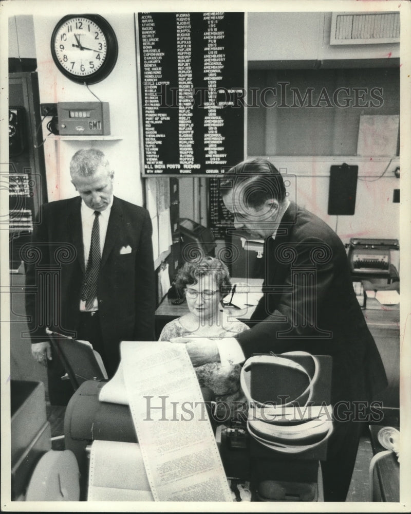 1963 Press Photo Edward R. Murrow looks over teletype facilities - mjx66296 - Historic Images