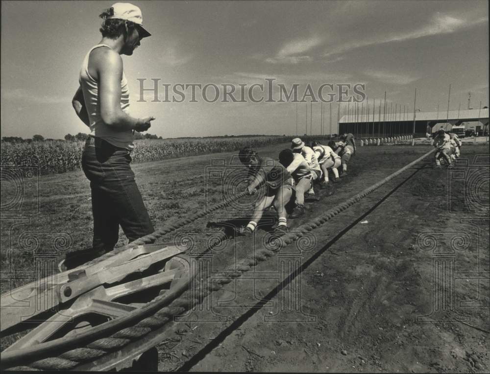 1988 Tug-Of-War Champions from Orfordville train using pulleys - Historic Images