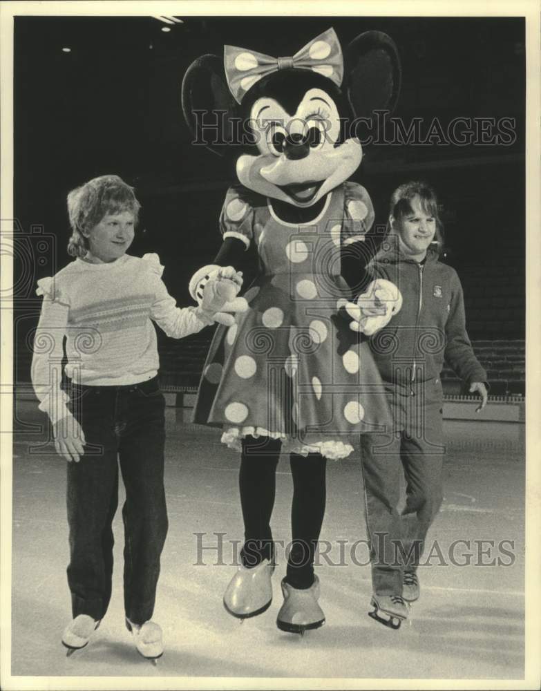 1984 Minnie Mouse skates with visually impaired children, Milwaukee - Historic Images