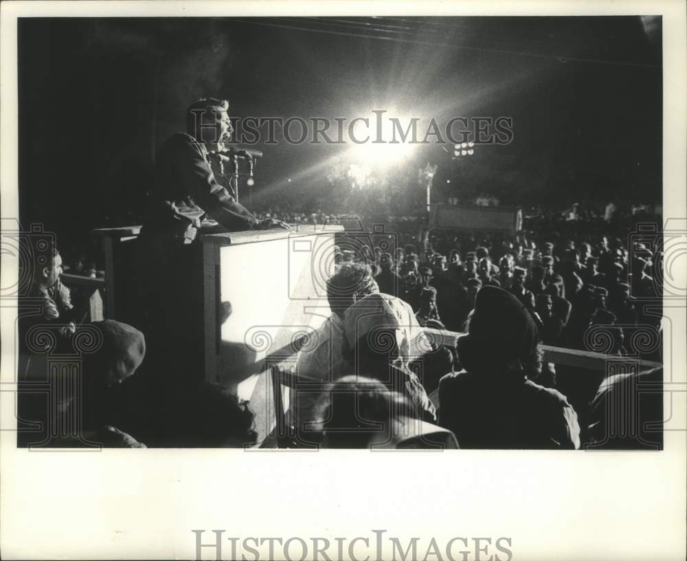 1964 Raul Castro giving speech under floodlights - Historic Images