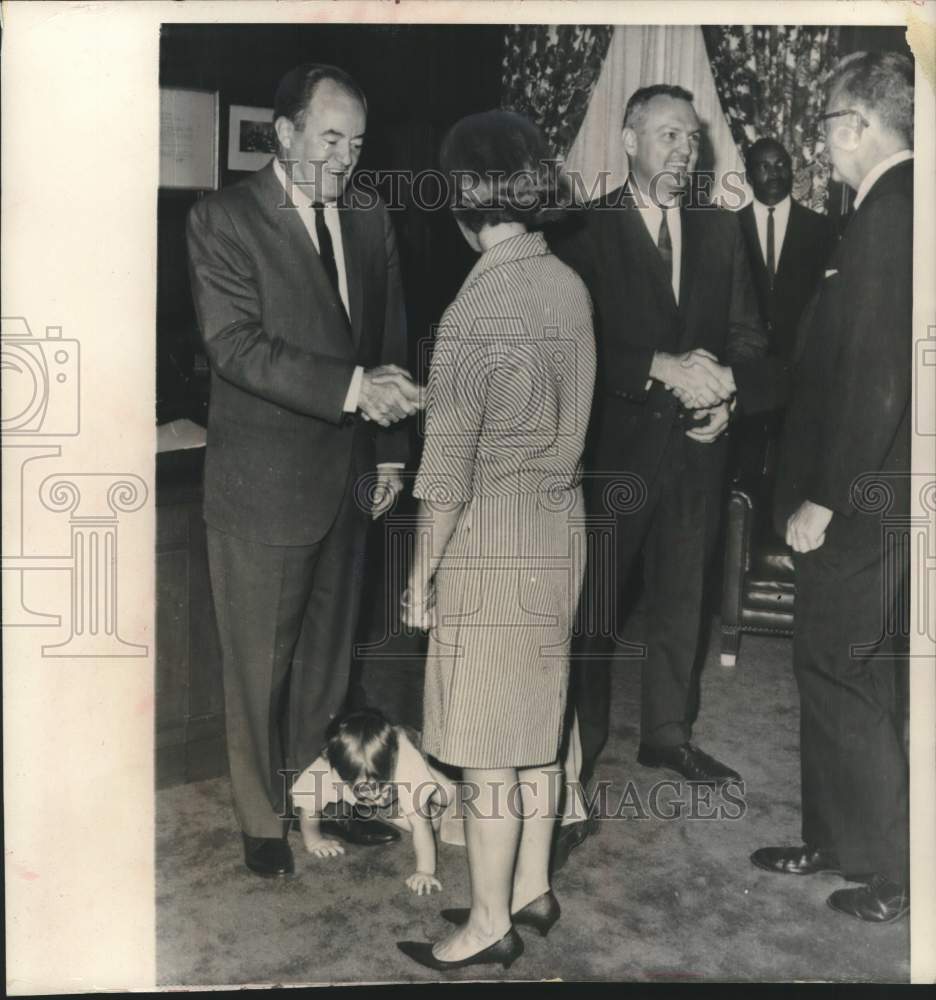 1965 Paul Foley crawled over foot of Vice President Humphrey.-Historic Images