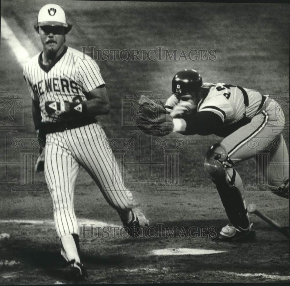 1981 Brewers&#39; Charlie Moore runs across home plate, County Stadium - Historic Images