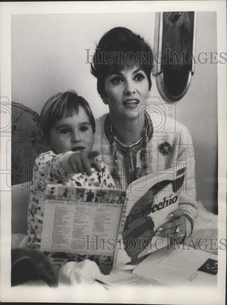 1961 Gina Lollobrigida reads to her son at their home in Rome-Historic Images