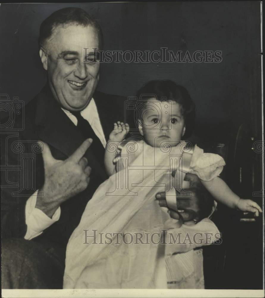 1936 President Roosevelt and granddaughter, Kate. - Historic Images