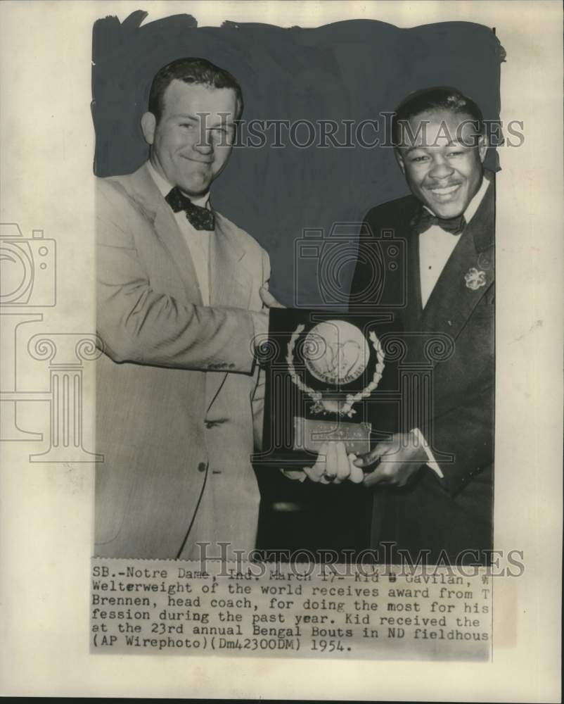 1954 Boxer Kid Gavilan receives award from the head coach in Indiana - Historic Images