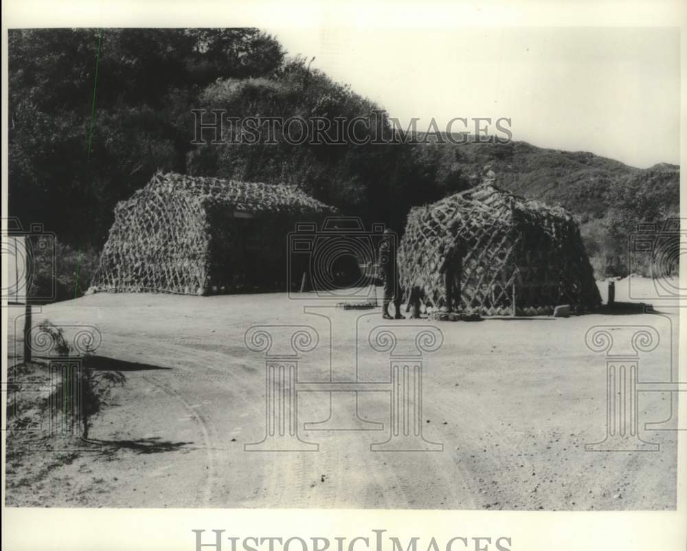 1963 Press Photo Huts on main road to store food for "Peace Corps," S. Korea. - Historic Images