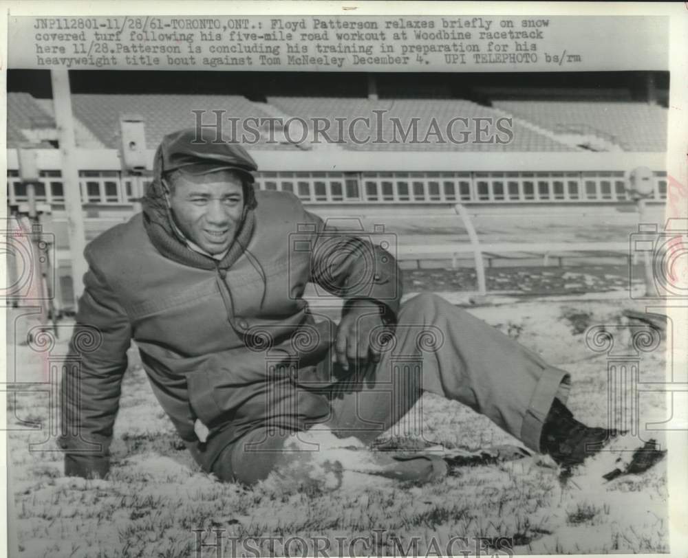 1961 Boxer Floyd Patterson at Woodbine racetrack, Toronto, Ontario - Historic Images