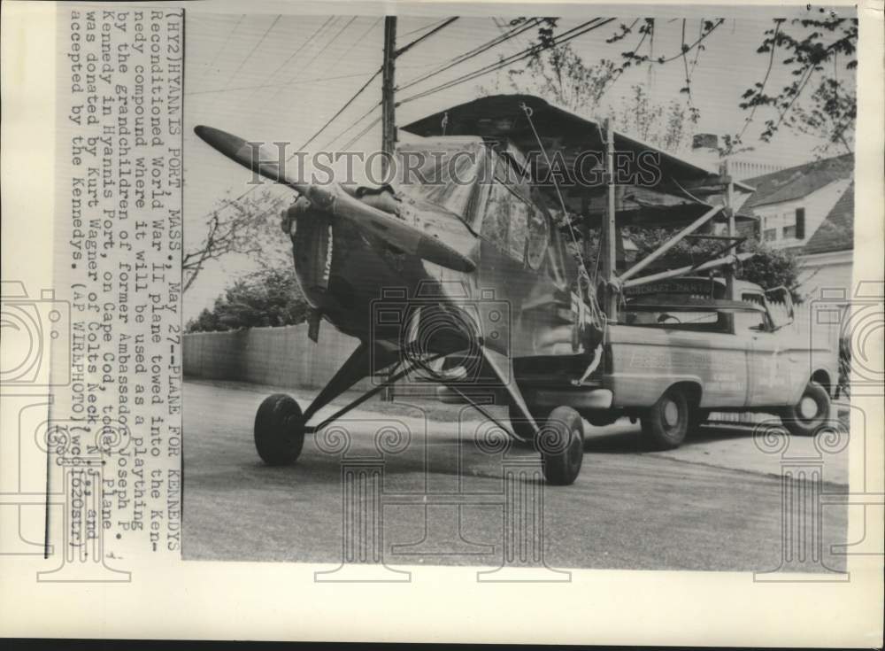1966 Press Photo Reconditioned World War II plane towed onto Kennedy compound - Historic Images