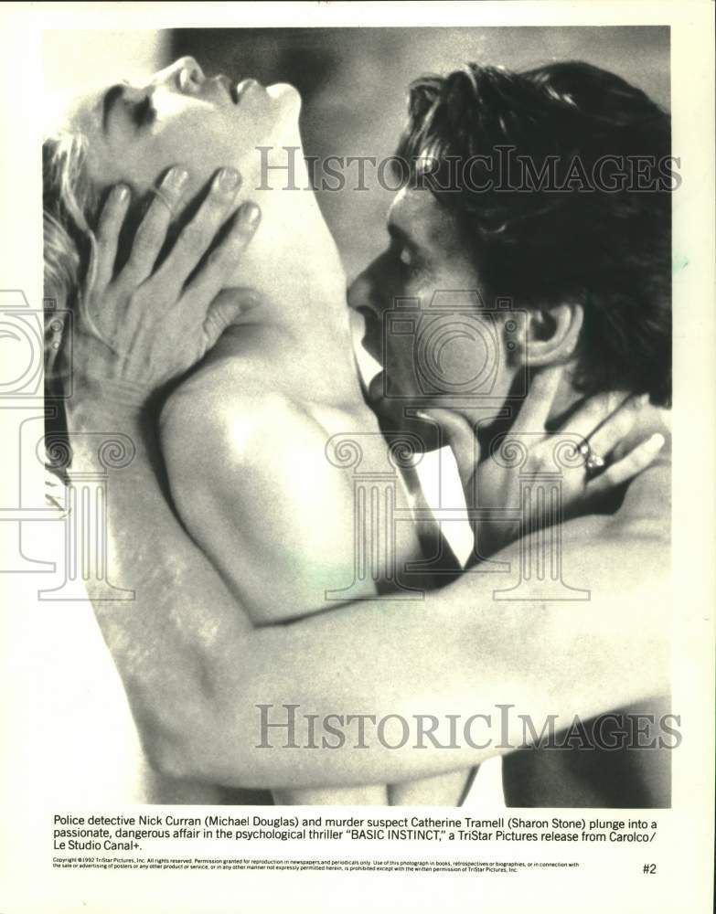 1992 Press Photo Michael Douglas and Sharon Stone in the Film &quot;Basic Instinct&quot; - Historic Images