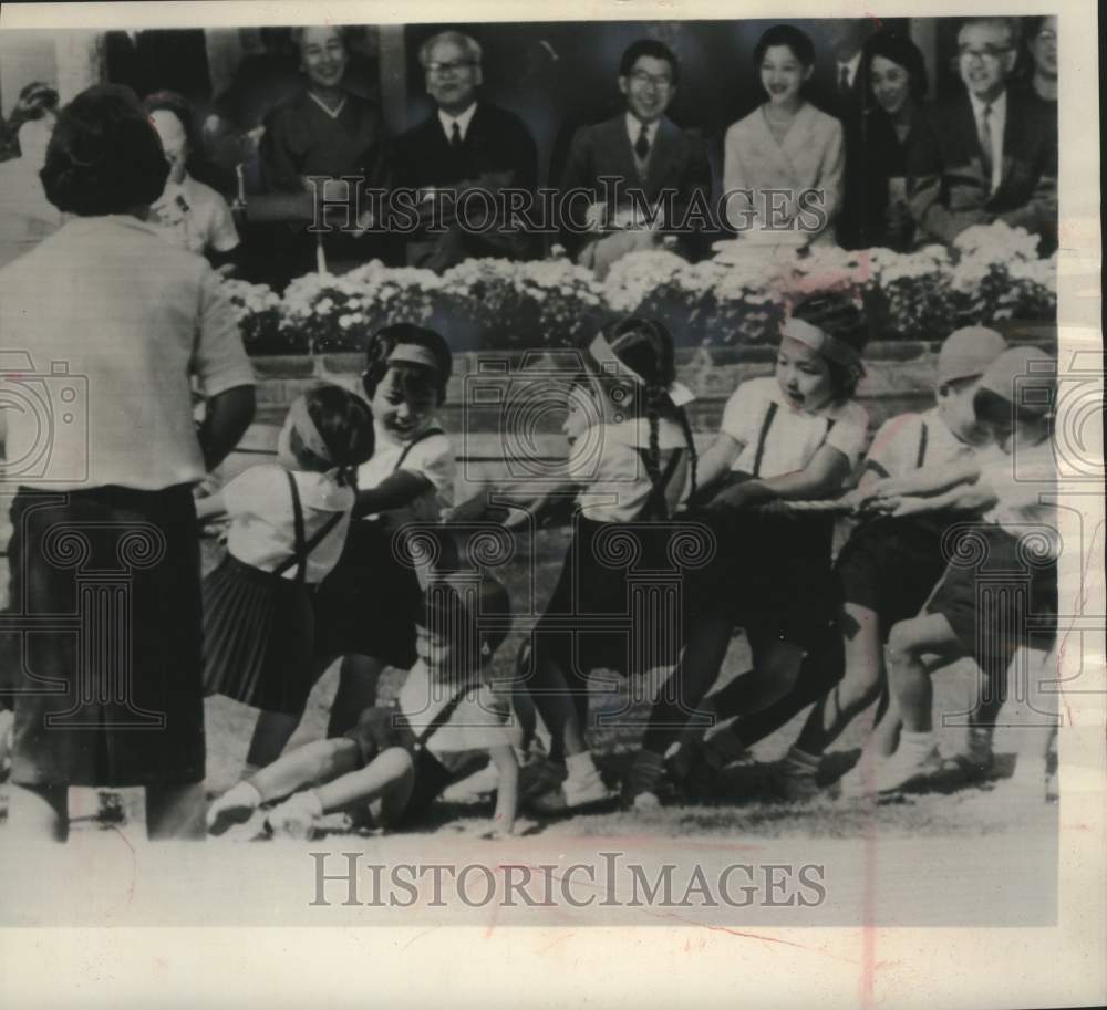 1964 Prince Hiro of Japan slips during tug of war with classmates-Historic Images
