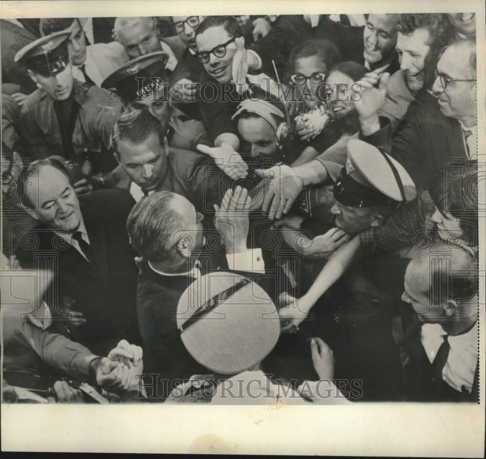 1964 Senator Hubert H. Humphrey &amp; others leaving convention hall - Historic Images