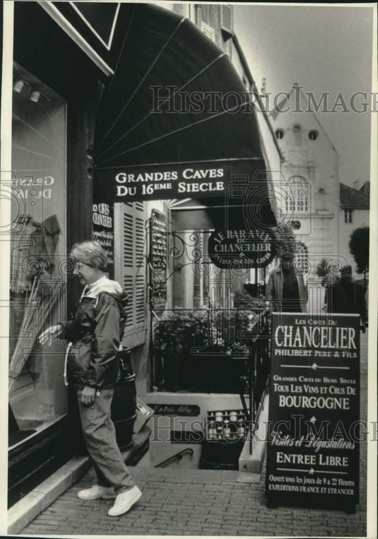 1995 Patron at Shop Located in the Ancient City of Beaune, France - Historic Images