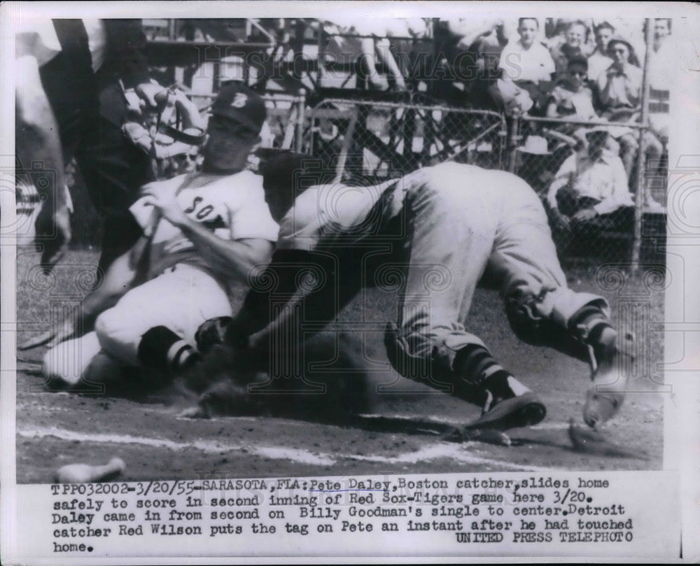 1955 Press Photo Boston Red Sox Catcher Pete Daley Slides Home-Historic Images