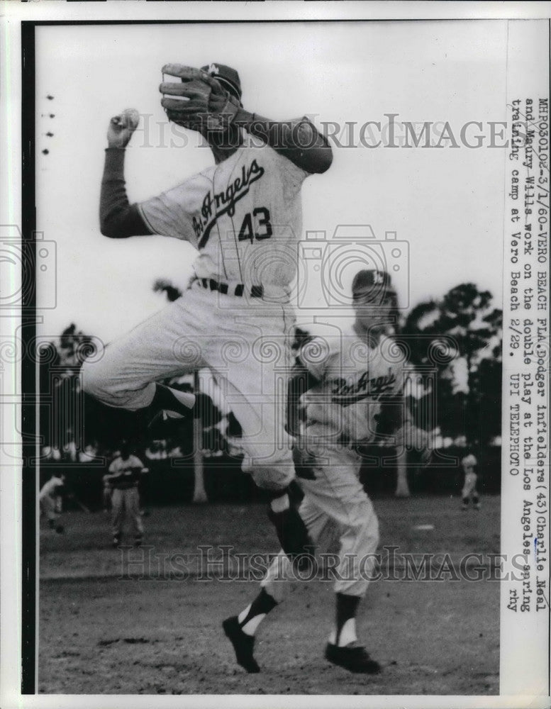 1960 Charlie Neal, Maury Mills work on a double play - Historic Images